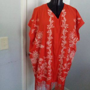 Denim 24/7 Cardigan , size on 12/16,color orange and cream.